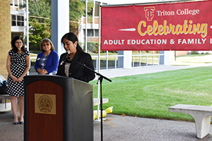 Brenda Morales speaks during the 2018 Adult Education and Family Literacy Week kickoff celebration at Triton College. 